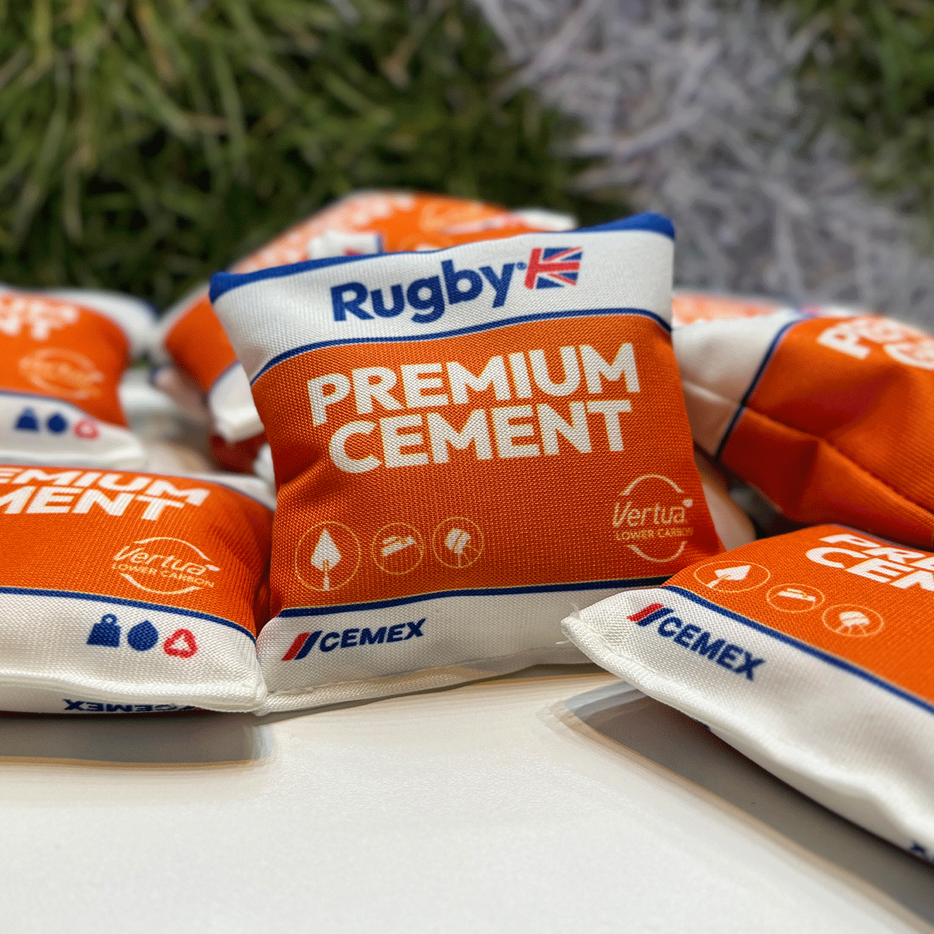 Gif showing various pieces of cemex packaging, magazines, social media, advertisments and flyers.