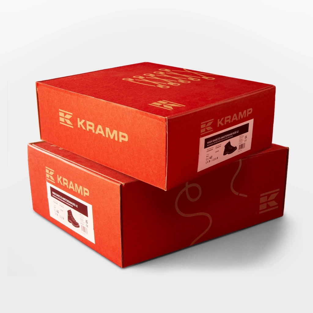 Photography of two stacked Kramp shoe boxes. Shot against a white background.